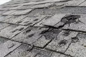 Hail damage causing granule loss on residential roof