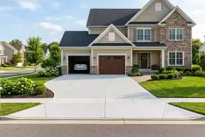 New concrete driveway installation improving curb appeal and safety
